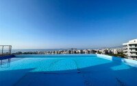 Modern 2+1 apartment with sea view and infinity pool on the roof in Mahmutlar-id-9973-photo-2