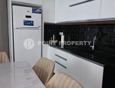 Modern 2+1 apartment with sea view and infinity pool on the roof in Mahmutlar-id-9973-photo-4