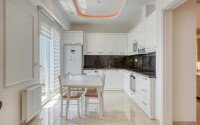 Стильный дуплекс 130 м² с небольшим видом на море в районе Махмутлар-id-9979-фото-2