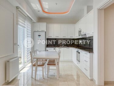 Стильный дуплекс 130 м² с небольшим видом на море в районе Махмутлар-id-9979-фото-2