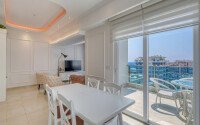 Стильный дуплекс 130 м² с небольшим видом на море в районе Махмутлар-id-9979-фото-4