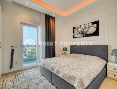 Стильный дуплекс 130 м² с небольшим видом на море в районе Махмутлар-id-9979-фото-5