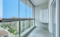 Стильный дуплекс 130 м² с небольшим видом на море в районе Махмутлар-id-9979-фото-10