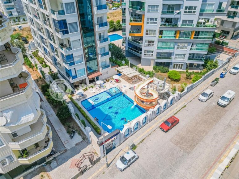 Стильный дуплекс 130 м² с небольшим видом на море в районе Махмутлар-id-9979-фото-12