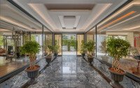 Стильный дуплекс 130 м² с небольшим видом на море в районе Махмутлар-id-9979-фото-15