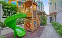 Стильный дуплекс 130 м² с небольшим видом на море в районе Махмутлар-id-9979-фото-16