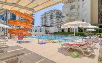 Стильный дуплекс 130 м² с небольшим видом на море в районе Махмутлар-id-9979-фото-18
