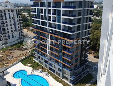 Modern apartment 55 m² in Mahmutlar area with panoramic windows and infrastructure-id-9987-photo-1