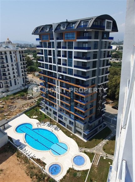 Modern apartment 55 m² in Mahmutlar area with panoramic windows and infrastructure-id-9987-photo-1