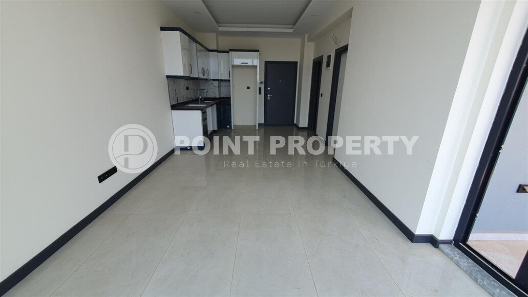Modern apartment 55 m² in Mahmutlar area with panoramic windows and infrastructure-id-9987-photo-2