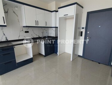 Modern apartment 55 m² in Mahmutlar area with panoramic windows and infrastructure-id-9987-photo-3