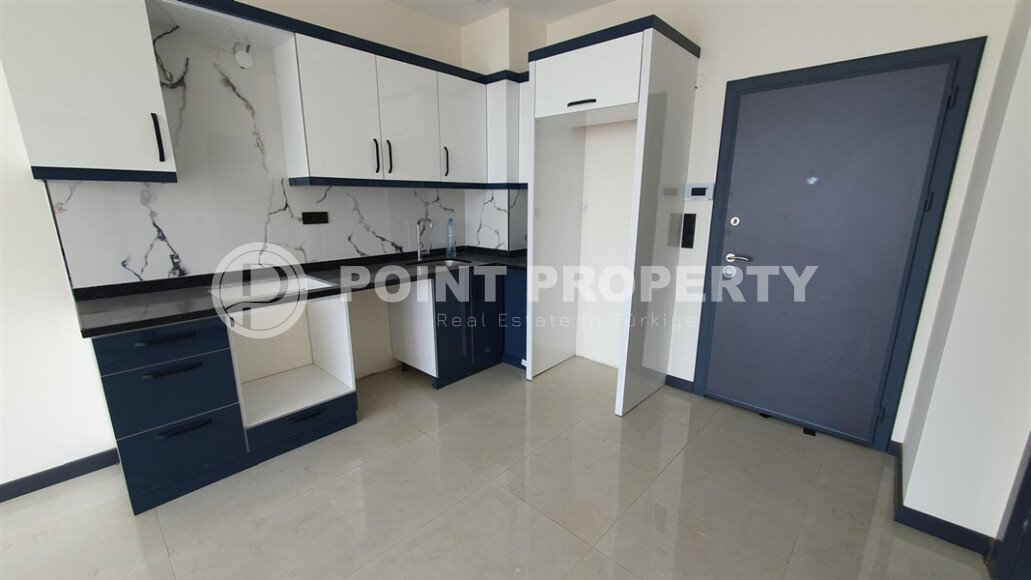 Modern apartment 55 m² in Mahmutlar area with panoramic windows and infrastructure-id-9987-photo-3