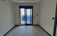 Modern apartment 55 m² in Mahmutlar area with panoramic windows and infrastructure-id-9987-photo-4