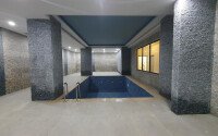 Modern apartment 55 m² in Mahmutlar area with panoramic windows and infrastructure-id-9987-photo-8