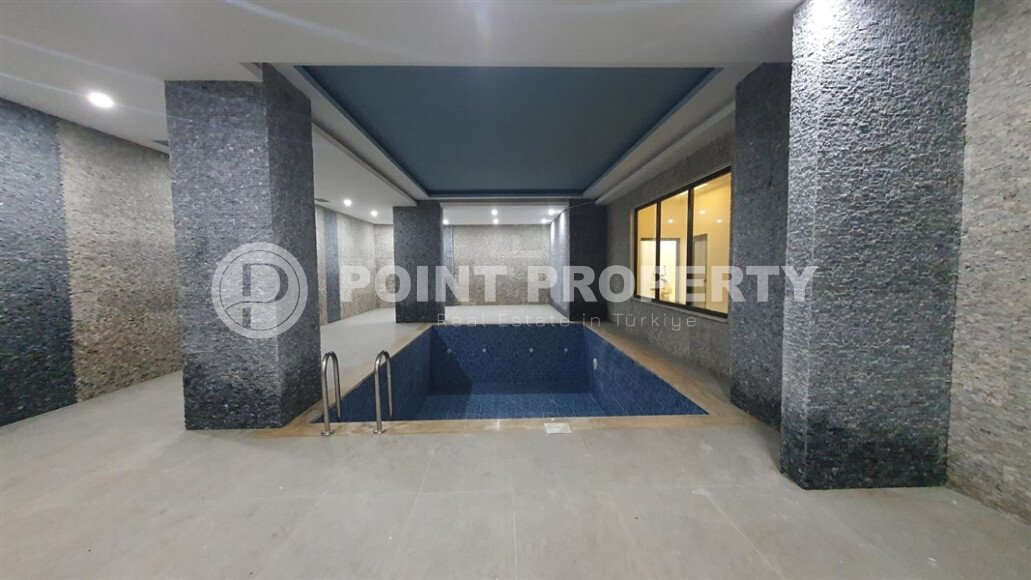 Modern apartment 55 m² in Mahmutlar area with panoramic windows and infrastructure-id-9987-photo-8