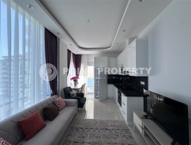 Меблированная квартира 1+1, 50 м², в современном комплексе 2021 года в Махмутларе-id-9997-фото-2