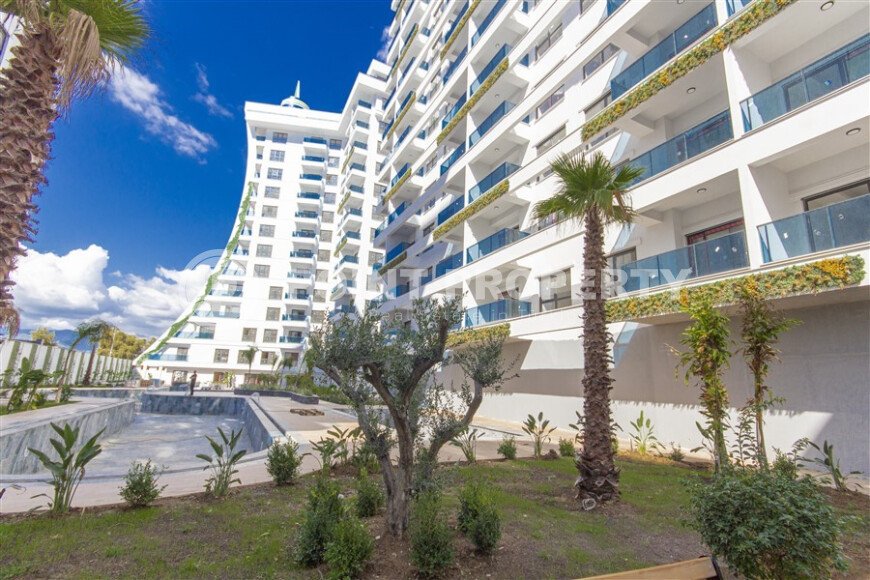 Просторный дуплекс 4+1, 130 м² с панорамным видом на море в элитном комплексе Махмутлара-id-9999-фото-2