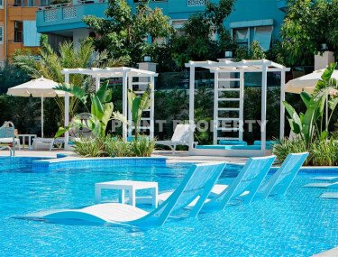 Apartment 1+1 with furniture in a new complex of 2023, 57 m², Alanya center - Gullerpinary district-id-10001-photo-1