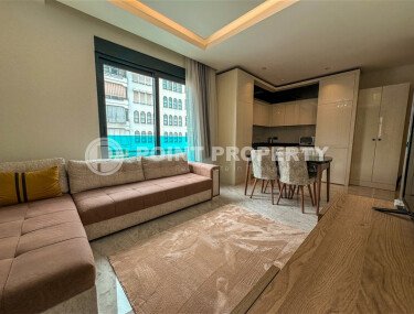 Apartment 1+1 with furniture in a new complex of 2023, 57 m², Alanya center - Gullerpinary district-id-10001-photo-2