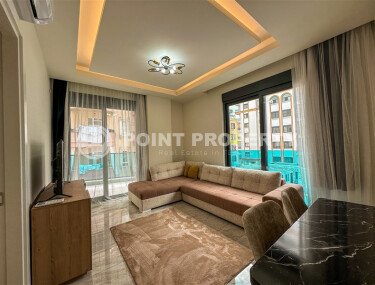 Apartment 1+1 with furniture in a new complex of 2023, 57 m², Alanya center - Gullerpinary district-id-10001-photo-3