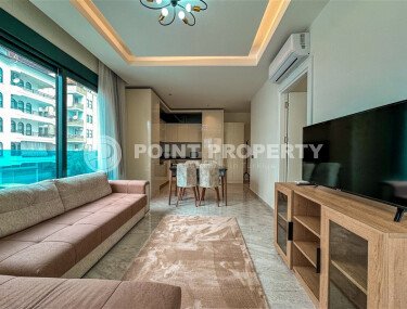 Apartment 1+1 with furniture in a new complex of 2023, 57 m², Alanya center - Gullerpinary district-id-10001-photo-4