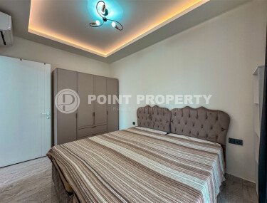 Apartment 1+1 with furniture in a new complex of 2023, 57 m², Alanya center - Gullerpinary district-id-10001-photo-5