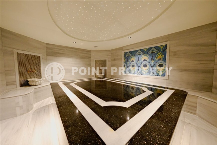 Квартира 1+1 с мебелью в новом комплексе 2023 года, 57 м², центр Алании – район Гюллерпынары-id-10001-фото-10