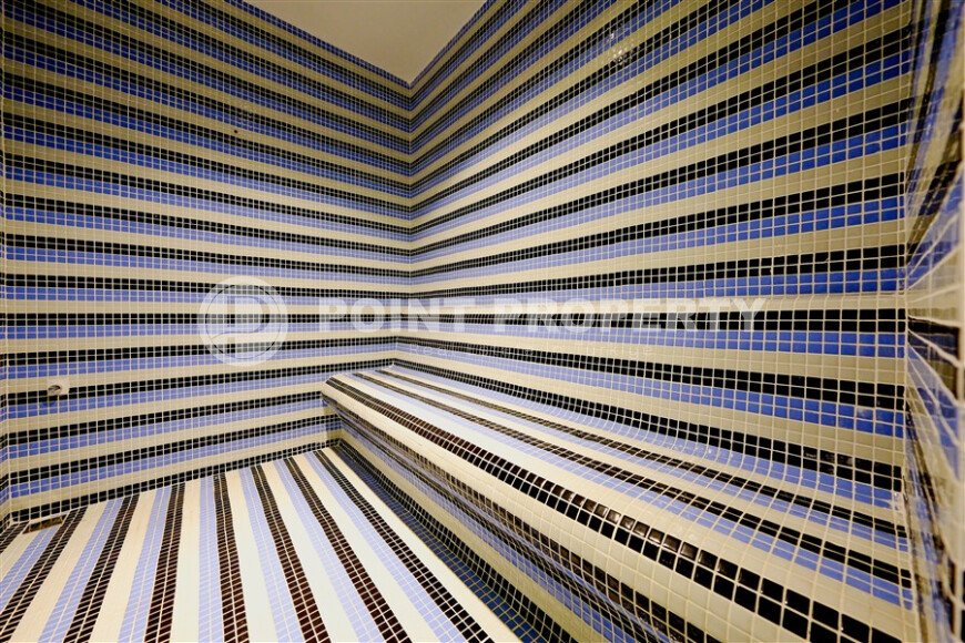 Квартира 1+1 с мебелью в новом комплексе 2023 года, 57 м², центр Алании – район Гюллерпынары-id-10001-фото-14