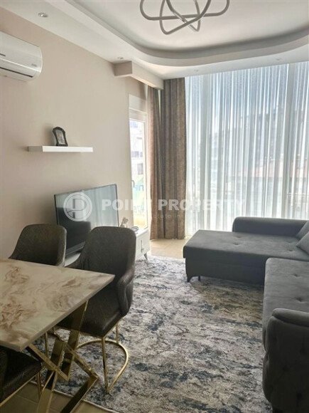 Стильная квартира 1+1 площадью 65 м² в Махмутларе — от одного из лучших застройщиков-id-10003-фото-4