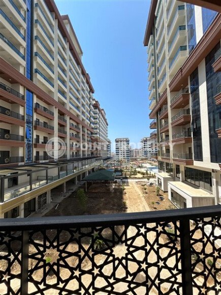 Современная квартира 2+1 площадью 100 м² в Махмутларе — масштабный проект от элитного застройщика-id-10004-фото-17