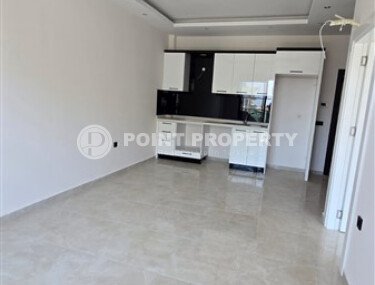 Квартира 1+1 по выгодной цене в новом комплексе района Махмутлар-id-10007-фото-2