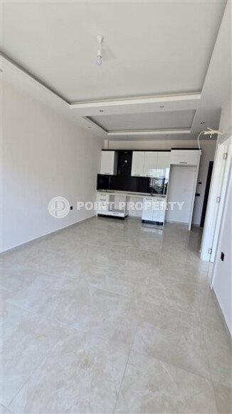 Квартира 1+1 по выгодной цене в новом комплексе района Махмутлар-id-10007-фото-2