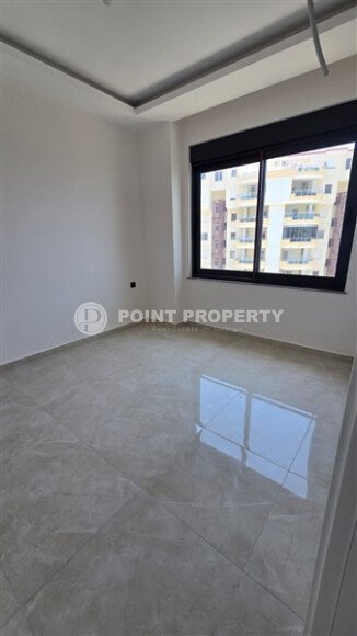 Квартира 1+1 по выгодной цене в новом комплексе района Махмутлар-id-10007-фото-3