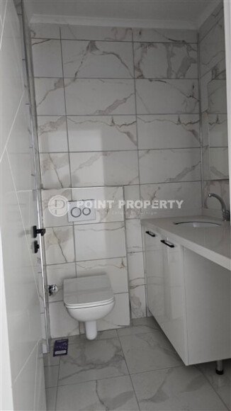 Квартира 1+1 по выгодной цене в новом комплексе района Махмутлар-id-10007-фото-9