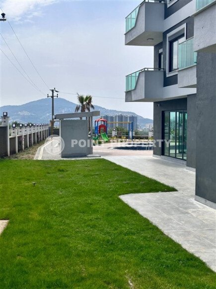 Квартира 1+1 по выгодной цене в новом комплексе района Махмутлар-id-10007-фото-13