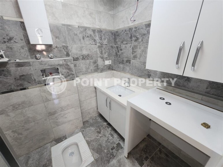 Стильная квартира 2+1 с отдельной кухней и возможностью получения ВНЖ — 110 м² в нижней Оба, Аланья-id-10008-фото-8