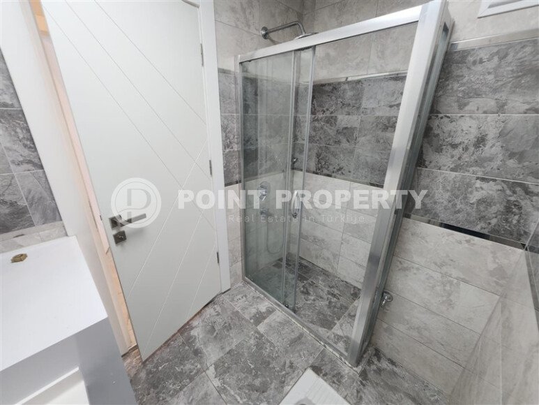 Стильная квартира 2+1 с отдельной кухней и возможностью получения ВНЖ — 110 м² в нижней Оба, Аланья-id-10008-фото-9