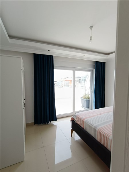 Просторный дуплекс 2+1 с террасой и видом на море — 110 м², Махмутлар-id-10010-фото-22