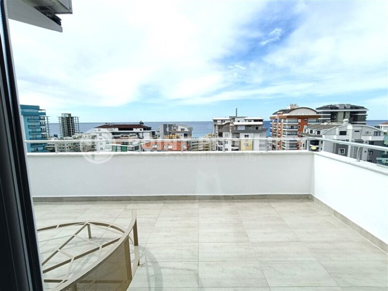 Просторный дуплекс 2+1 с террасой и видом на море — 110 м², Махмутлар-id-10010-фото-27