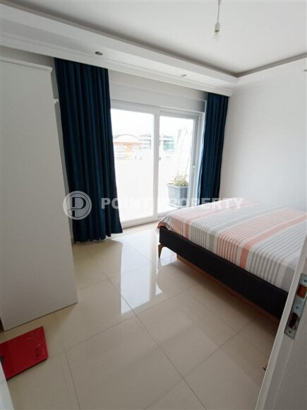 Просторный дуплекс 2+1 с террасой и видом на море — 110 м², Махмутлар-id-10010-фото-28