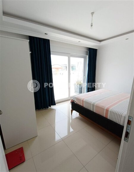 Просторный дуплекс 2+1 с террасой и видом на море — 110 м², Махмутлар-id-10010-фото-29