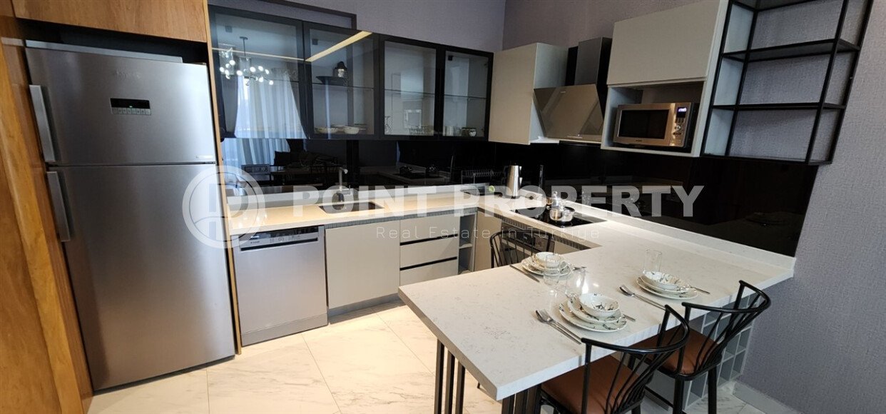 Стильная квартира 65 м² в районе Каргыджак на первой береговой линии-id-10012-фото-3