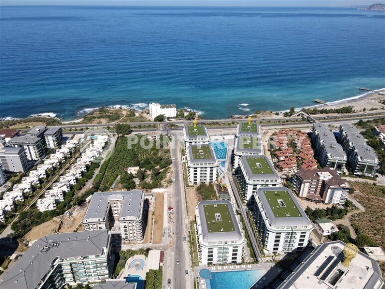Шикарная квартира 1+1 с видом на море в элитном комплексе на первой береговой линии, Каргыджак-id-10014-фото-1
