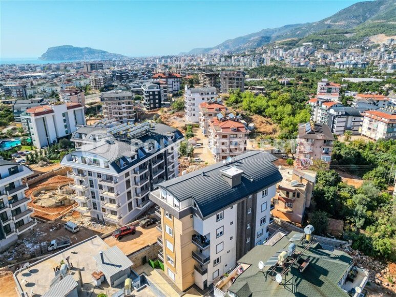 Apartment 1+1 area 50 m² in a new cozy residential complex in the green part of Alanya-id-10019-photo-1