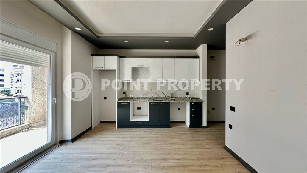 Apartment 1+1 area 50 m² in a new cozy residential complex in the green part of Alanya-id-10019-photo-2