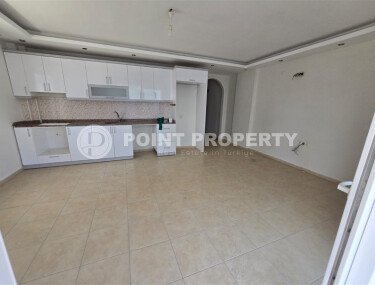 1+1 apartment with a large area of 85 m² and a spacious balcony in the center of Mahmutlar-id-10020-photo-9