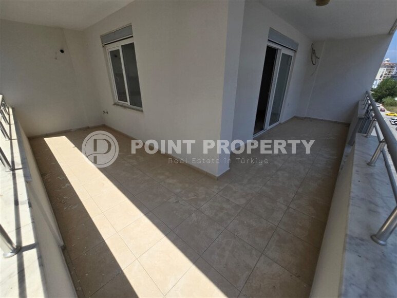 Квартира 1+1 с большой площадью 85 м² и просторным балконом в центре Махмутлара-id-10020-фото-4