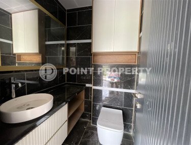 Современная квартира 1+1 с ремонтом в верхней части района Оба в комплексе с премиальной инфраструктурой-id-10021-фото-4