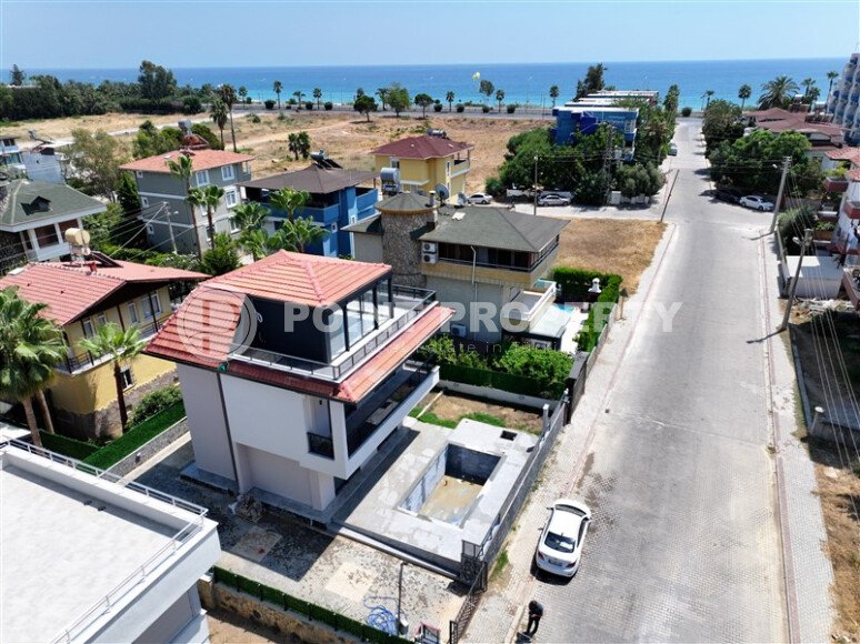 Luxury three-storey villa 3+1 - 210 m² in Konakli, only 150 m from the sea-id-10026-photo-1