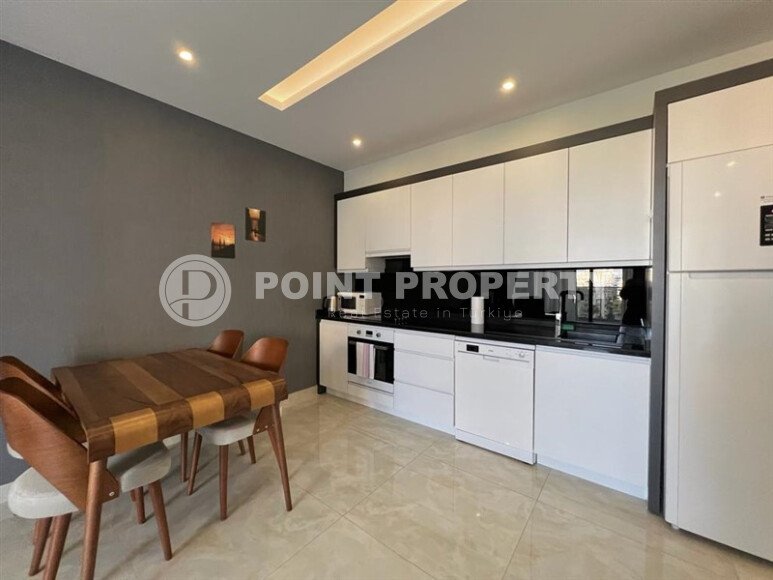 Квартира 1+1 площадью 60 м² на первой береговой линии в Махмутларе-id-10028-фото-1